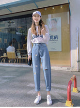 Pantalones vaqueros ajustados con estampado de margaritas y cintura alta